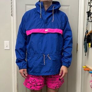 Vibrant Blue Raincoat with Pink Detail